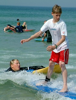 surfer in wet t-shirt